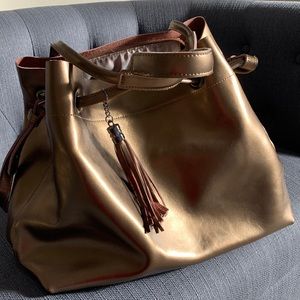 Leather bag. Handmade. Brand new. Gold/bronze color.